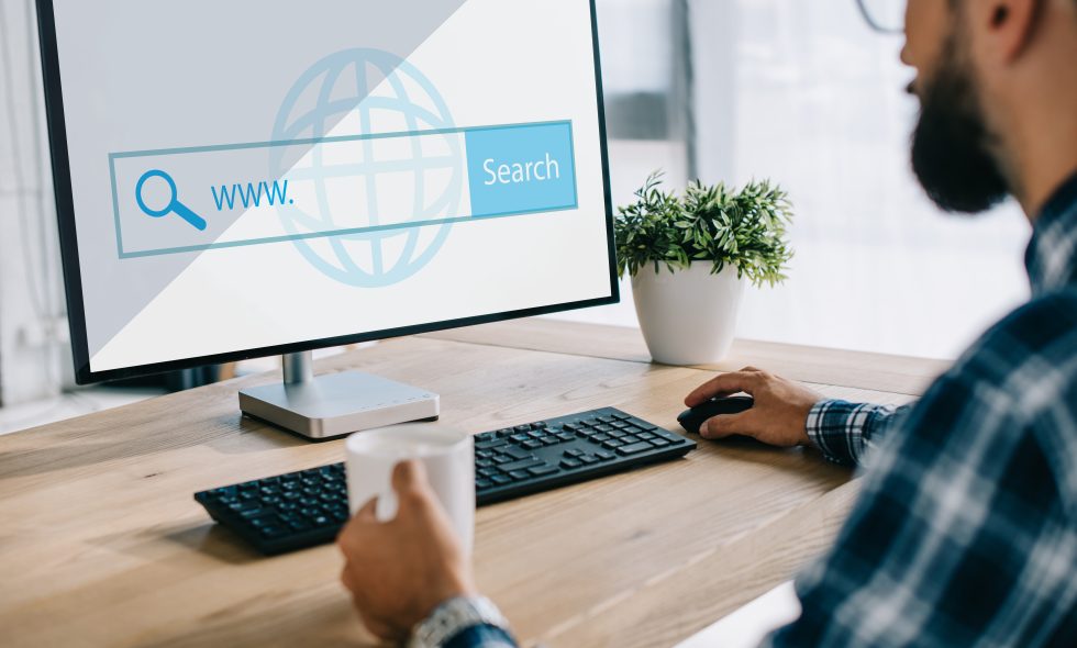 SEO manager searches for available domain names for his small business startup.