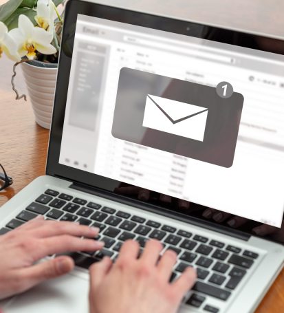 Person sets up email with Google Workspace or Microsoft for their small business.
