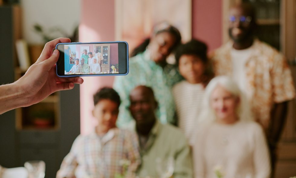 Small business owner takes promotional photo to engage Instagram followers and grow their business.