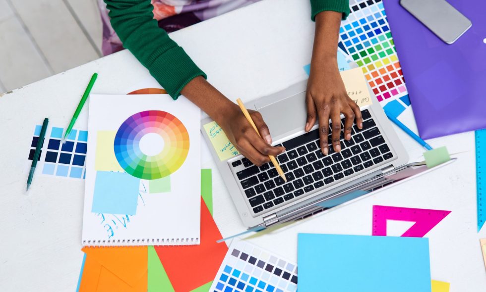 Graphic designer on fiverr sets up for design project for small business management.