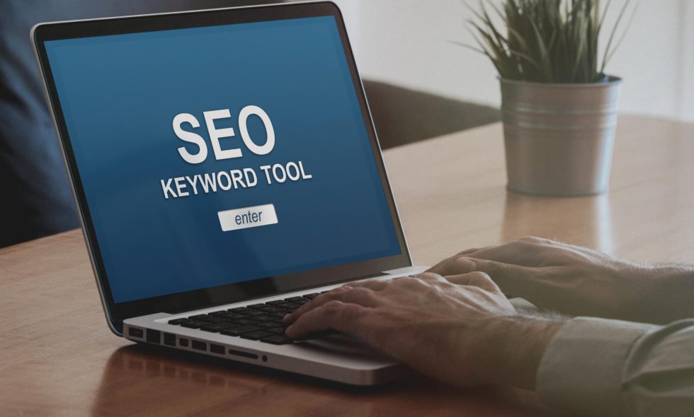 Small business owner uses SEO keyword tool to amplify their business website through selecting the best & highest quality words.